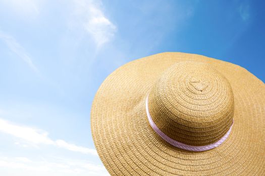 summer sunshine straw hat in blue sky on a sunny day. sunglasses summer concept with copy space blue background relaxation, Holiday,travel, beach,sun concept close up