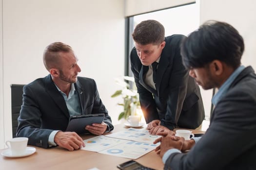 Group of Business financial with finance reports to analyze big data, balance sheet, strategy at meeting room