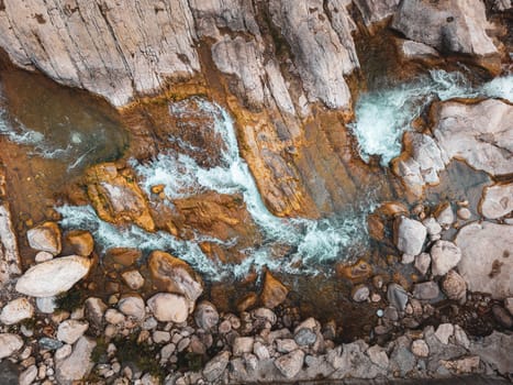 River flowing between rocks with motion blur shot with long exposure technique