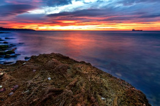 Amazing warm sunrise over the sea.