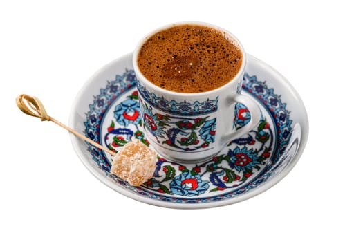 Turkish coffee in classic coffee cup on isolated white background