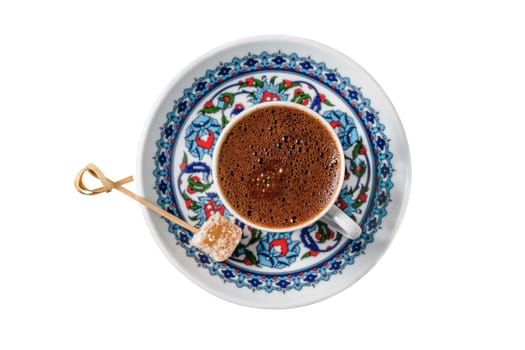Turkish coffee in classic coffee cup on an isolated white background