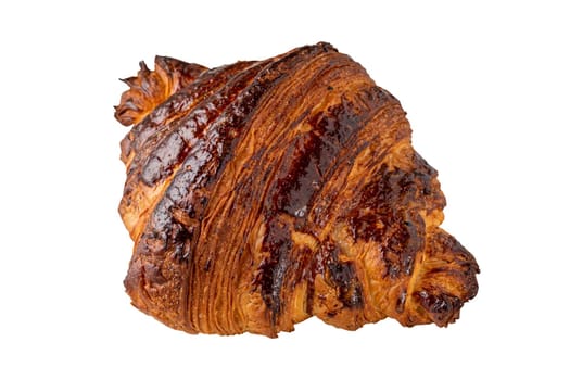 Croissant with coffee next to it on an isolated white background