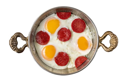 fried eggs with turkish sausage on white background
