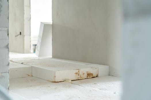 insulation of floors with polystyrene on the construction site. High quality photo