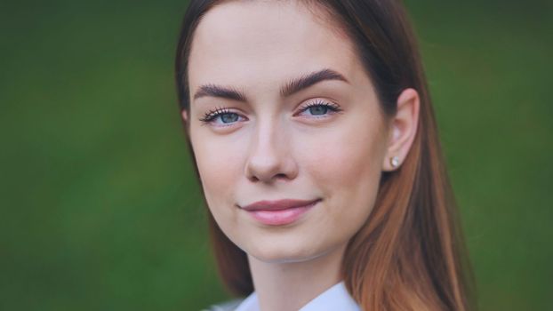 Portrait of an 18-year-old girl. Close-up of her face