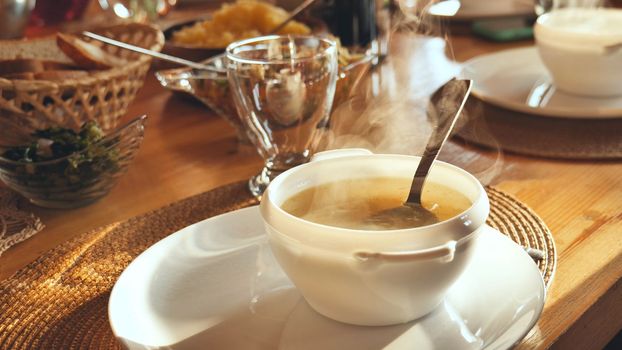 Hot soup on the table in the house