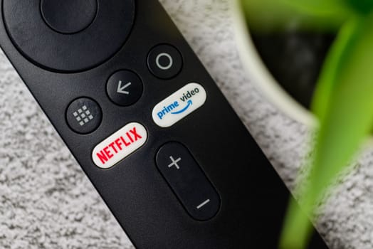 Antalya, Turkey - January 17, 2023: Netflix and Amazon prime video buttons on Smart TV remote