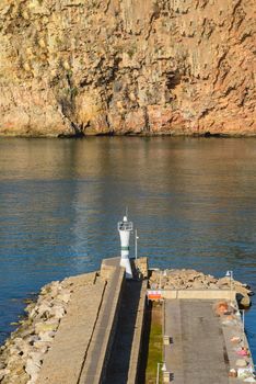 The view of the breakwater and the lighthouse at the Old Antalya Marina in Kaleici