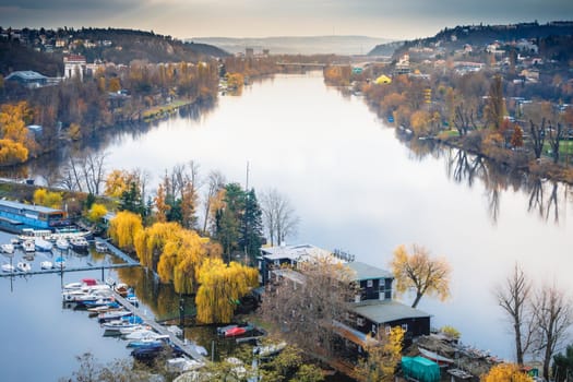 Panoramic view over the cityscape of Prague and Vltava river at dramatic sunset, Czech Republic