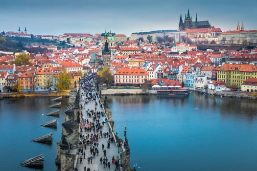 Panoramic view over the cityscape of Prague and Vltava river at dramatic sunset, Czech Republic