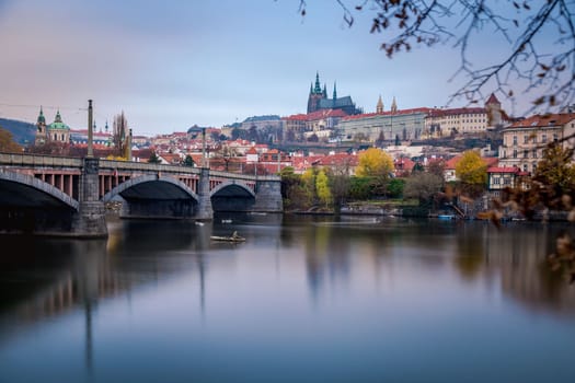 Panoramic view over the cityscape of Prague and Vltava river at dramatic sunset, Czech Republic