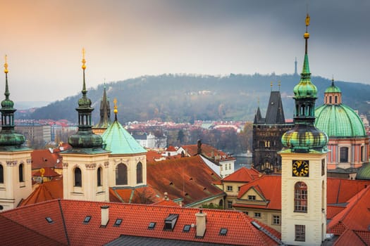 Panoramic view over the cityscape of Prague roofs at dramatic sunset, Czech Republic