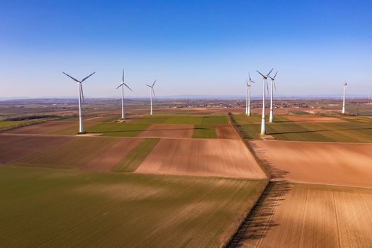 Wind power is installed on hills in rural areas