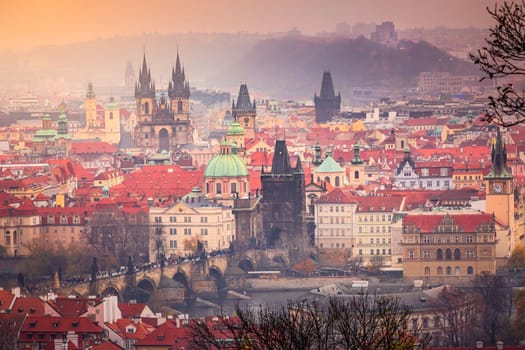 Panoramic view over the cityscape of Prague and Vltava river at dramatic evening, Czech Republic