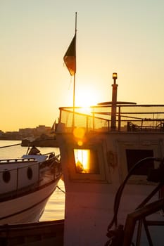 View of old fishing boat at sunset, Lampedusa