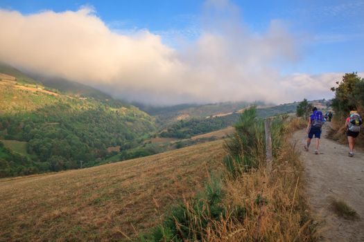 CEBREIRO, SPAIN - AUGUST, 09: Pilgrims along the way of St. James on August 09, 2016