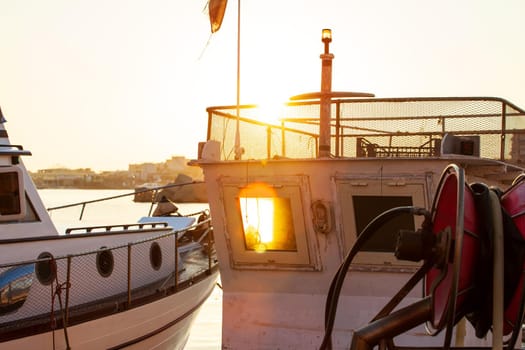 View of old fishing boat at sunset, Lampedusa