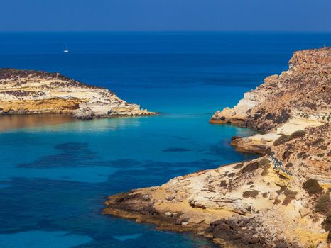View of the most famous sea place of Lampedusa, It is named Spiaggia dei conigli, in English language Rabbits Beach or Conigli island