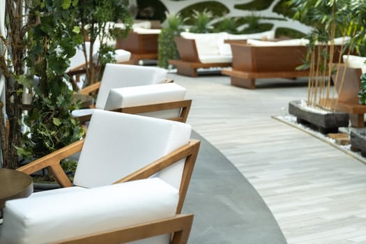 Cropped shot of a stylish light chair in the interior of the hall.