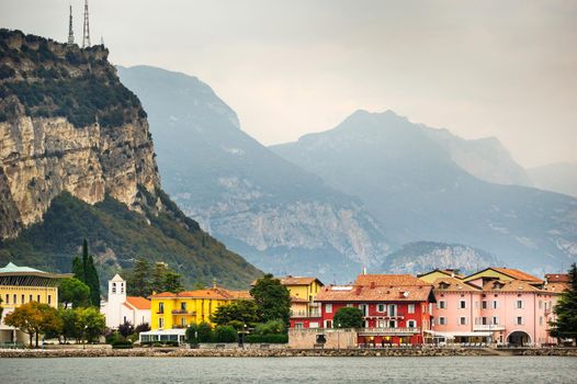 Beautiful lake Lago di Garda and the village of Torbole, Alpine scenery. Italy.