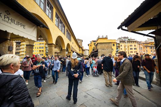 October 11, 2018.Tuscany.ITALY.FLORENCE: Police and tourists on the Ponte Vecchio Bridge.