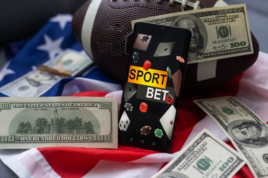 smartphone, money and rugby ball on light background. Concept of sports bet.