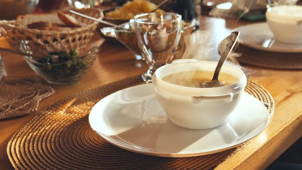 Hot soup on the table in the house