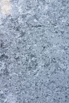 Blue frost pattern on glass closeup, background or texture