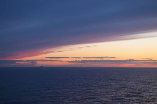 Ferry at sunset Very beautiful orange sky.