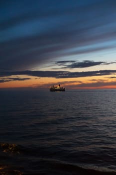 Ferry at sunset Very beautiful orange sky