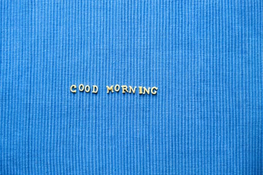 good morning sign on blue napkin