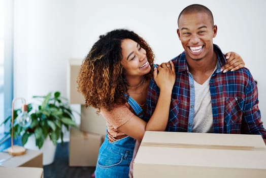 Not stressing rather enjoying our moving process. an attractive young couple moving house