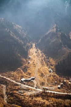 Top view of visit center in the big Almaty gorge and the bear gorge or ayusai, vertical. Almaty, Kazakhstan - October 25, 2022