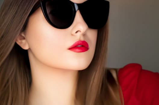 Beauty, fashion and style, face portrait of beautiful woman wearing stylish cat eye sunglasses and red lipstick make-up, luxury accessory and summer lifestyle, glamour and chic look.