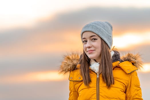portrait of a beautiful teenage girl at sunset. High quality photo
