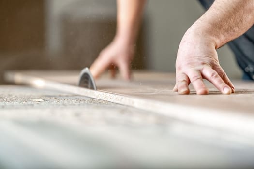 cutting laminate for the production of furniture on a circular saw. 