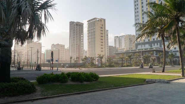 Urban infrastructure, park and highway among high-rise buildings. High quality photo