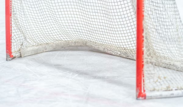 detail of a hockey goal on the ice. High quality photo