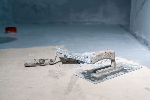 masonry work with a trowel on the construction site. High quality photo