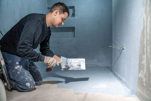 waterproofing of the bathroom floor in a new building.