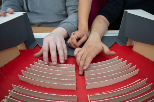 A visually impaired man uses a scanning and reading machine