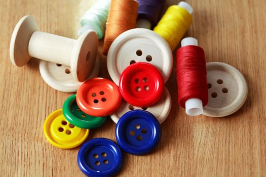 Diversity sewing set on old wooden background