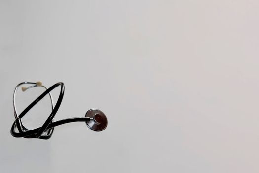 A place for recording, a medical object on a gray background. Medical equipment, top view, gray background, light background. Empty space.