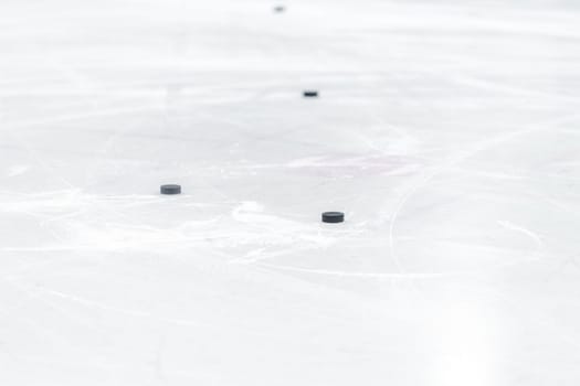 hockey puck on the ice of the winter stadium. High quality photo