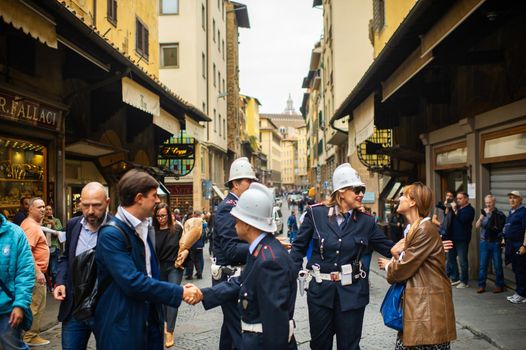 October 11, 2018.Tuscany.ITALY.FLORENCE: Police and tourists on the Ponte Vecchio Bridge.