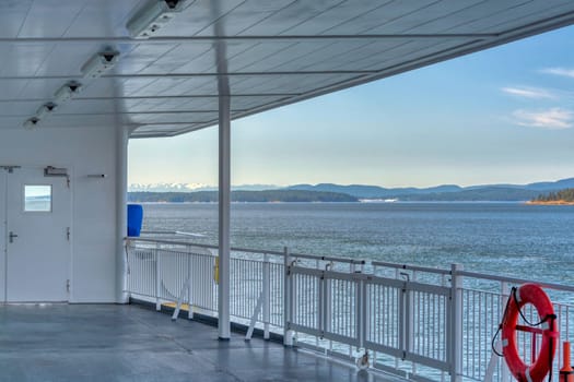 Vancouver island shore view from the deck of a ship.