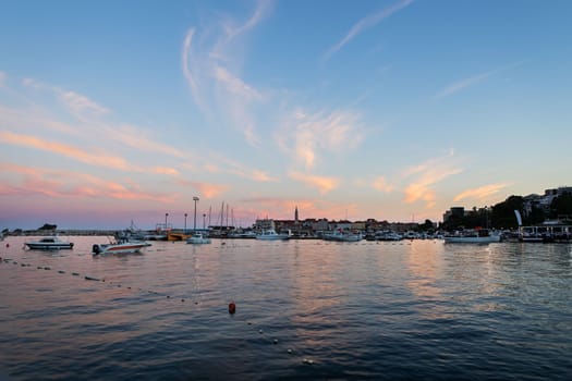 Very beautiful sunset on the pier, beautiful sky in Budva, Montenegro