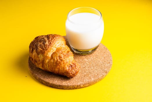 Wheat bread breakfast and milk in a morning, croissant, plate