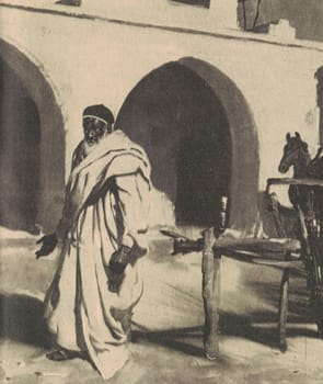 Black and white illustration shows an old Bedouin inside the courtyard. Vintage black and white picture shows adventure life in the previous century.